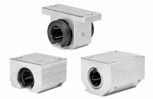 Aluminum bearing housings with mounted linear ball bearings