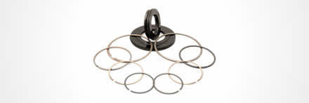 Zwarte Fey lamellenringen met meerdere open ringen in een cirkel