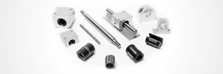 Lineaire assen, kogellagers en geleidingen met behuizing